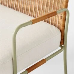 Colombe Green Metal And Rattan Outdoor Lounge Chair With Ivory Sunbrella® Cushions -Optimal Furniture Store ColombeVertLoungeChairAVSSS23 1