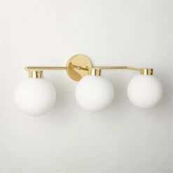 Marra 3-Bulb Polished Brass Globe Vanity Light