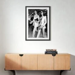 'Mick And Bianca At The London Airport, 1970' Photographic Print In Black Frame 17.5"x21.5" -Optimal Furniture Store SEMickNBiancaBlk33x39p5S22 3D